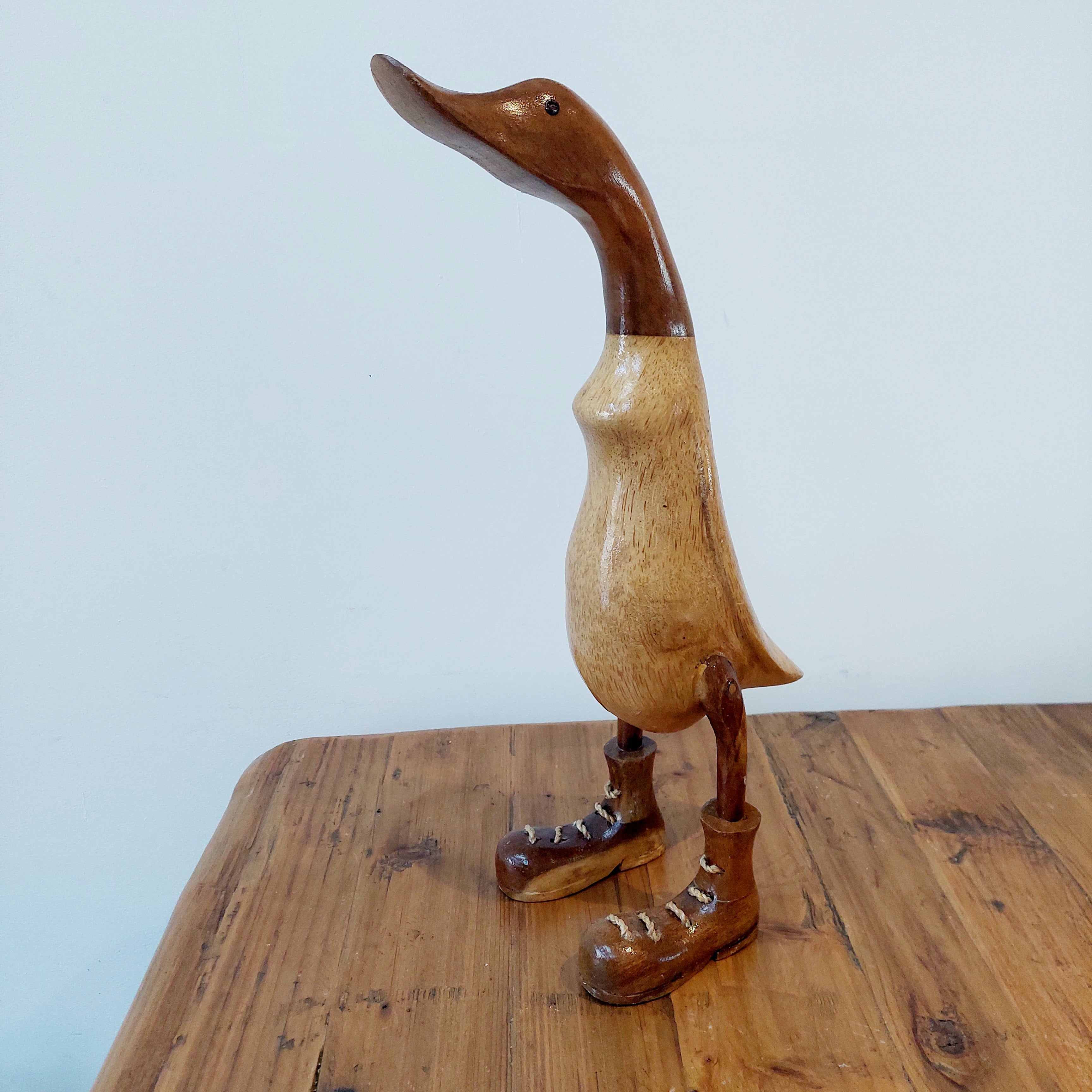 Wooden ducks 2025 with boots